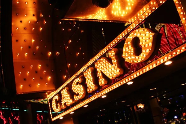 SA Gaming live-dealer table interface with croupier and betting layout